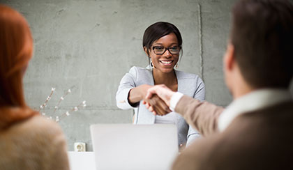 Loan Officer greeting a customer.